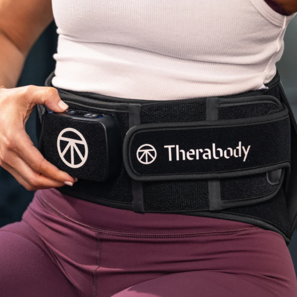therabody-thermback-LED-back-4in1-multi-modal-synergistic-back-pain-relief-man-student-carrying-books-back-view-rivete-advanced-recovery-and-mobility